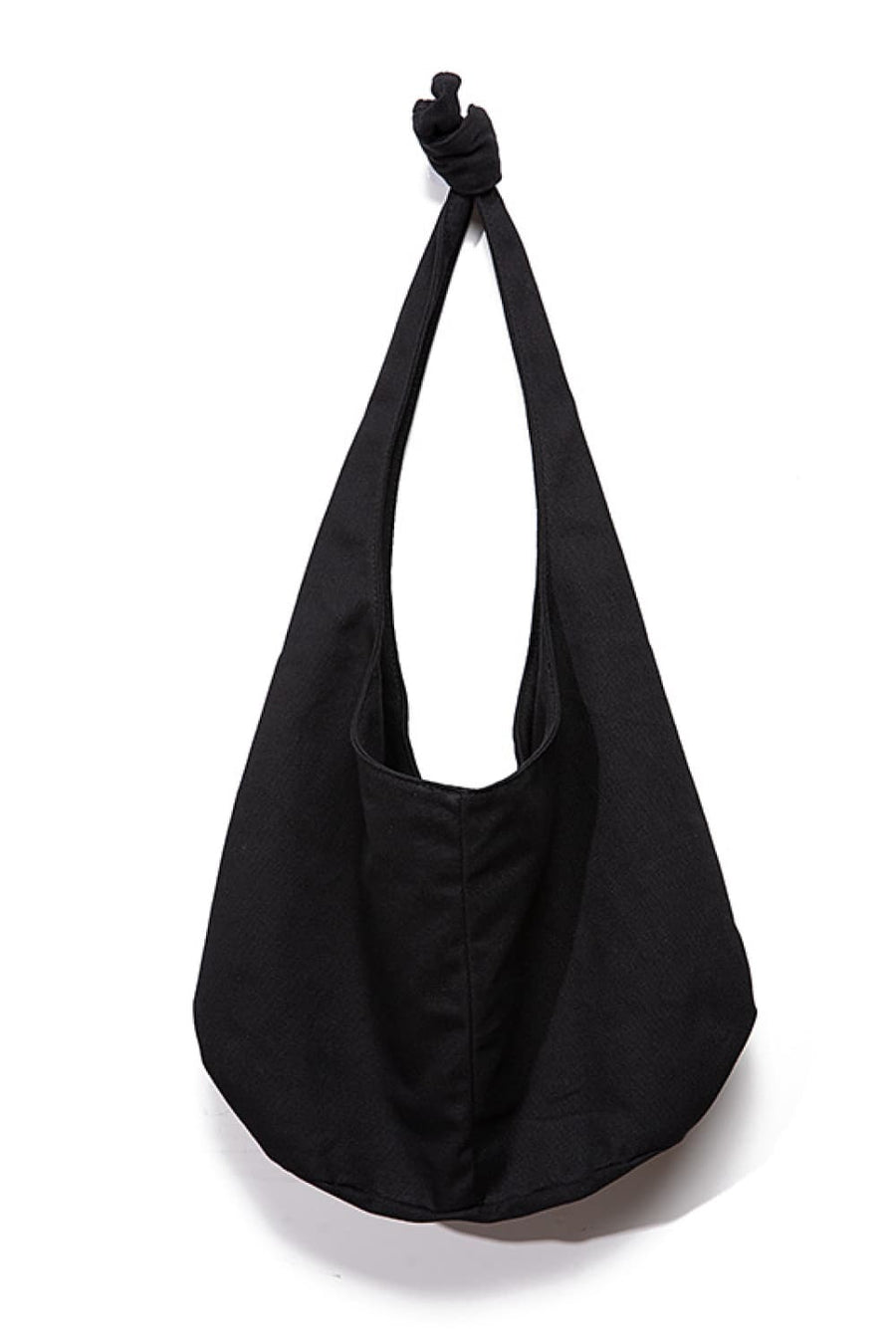 Black canvas shoulder bag with knotted strap detail and slouchy silhouette