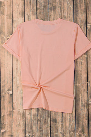 Watermelon pink t-shirt with cuffed sleeves and a twisted hem detail.