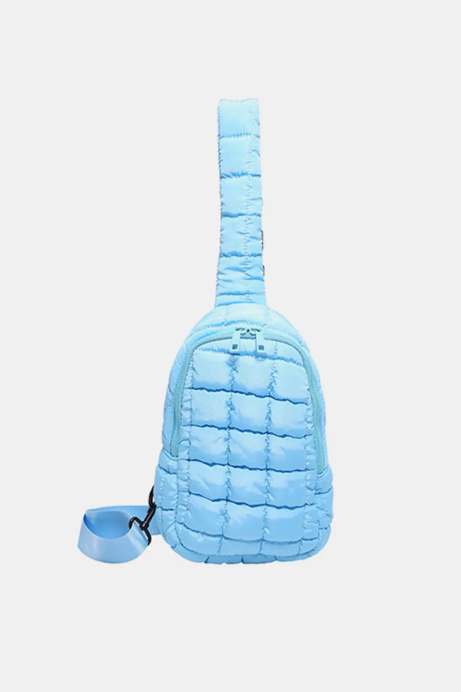 Padded sling bag in Pastel Blue with top handle and adjustable strap