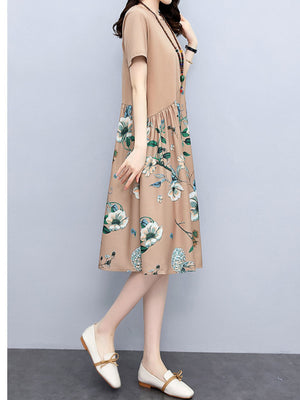 Blue A-line dress featuring seam detail and floral