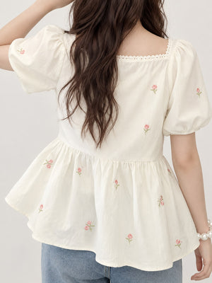 Picture Color blouse featuring peplum and floral