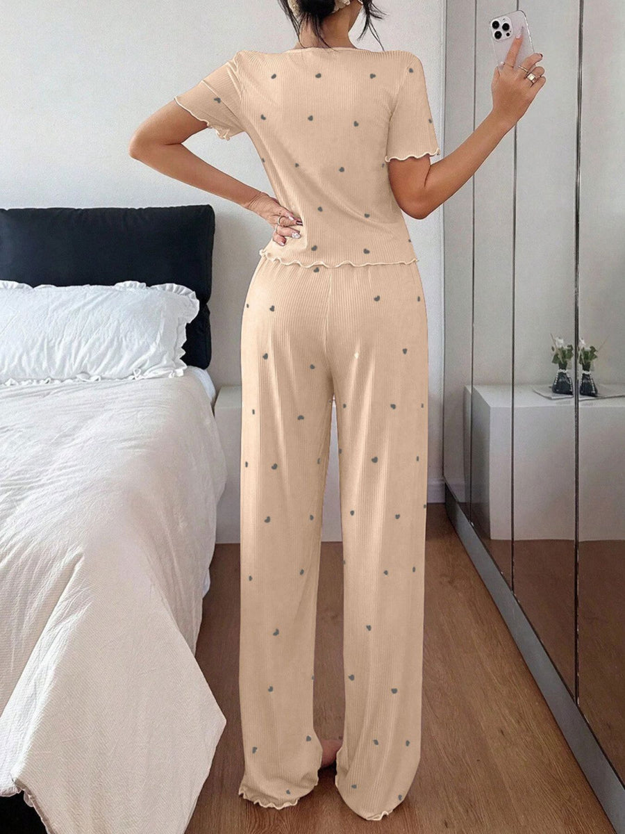 blush pink pajama set with half-button, elastic and heart-print