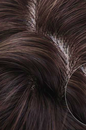 Baguette Bob wig in black/brown with wispy bangs, showing hair texture and root detail.