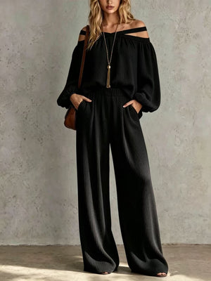 Black two-piece set with crisscross and long sleeve