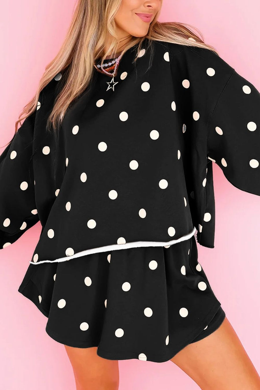 100% polyester Care instructions: Machine wash cold lounge set in Black with relaxed silhouette