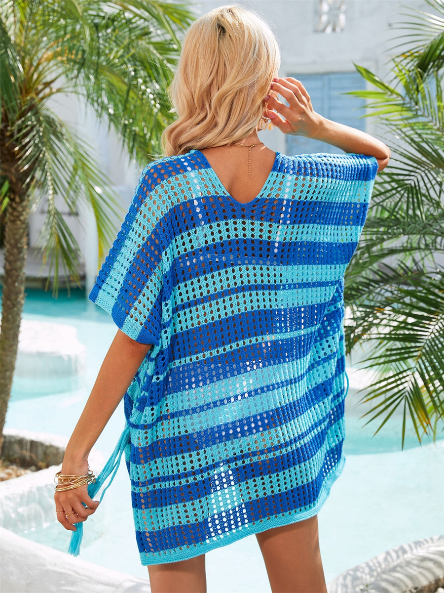 Striped crochet beach cover-up in Royal Blue and light blue with drawstring details.
