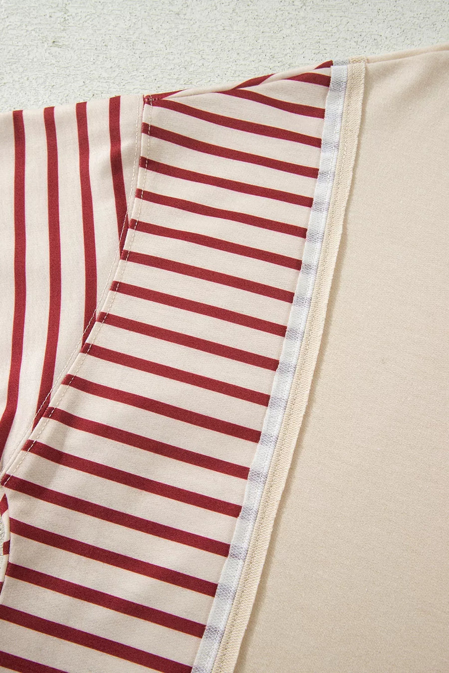sweatshirt featuring striped in burgundy with 100% polyester Care instructions: Machine wash cold texture