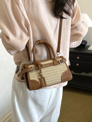 brown crossbody bag featuring adjustable strap and woven