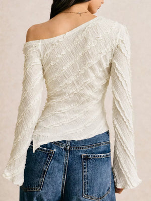 100% polyester Care instructions: Machine wash cold one-shoulder top in ivory with fitted silhouette