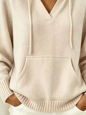 100% polyester Care instructions: Machine wash cold pullover hoodie in White with relaxed silhouette