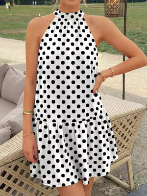 mini dress in black with polka dot and tiered