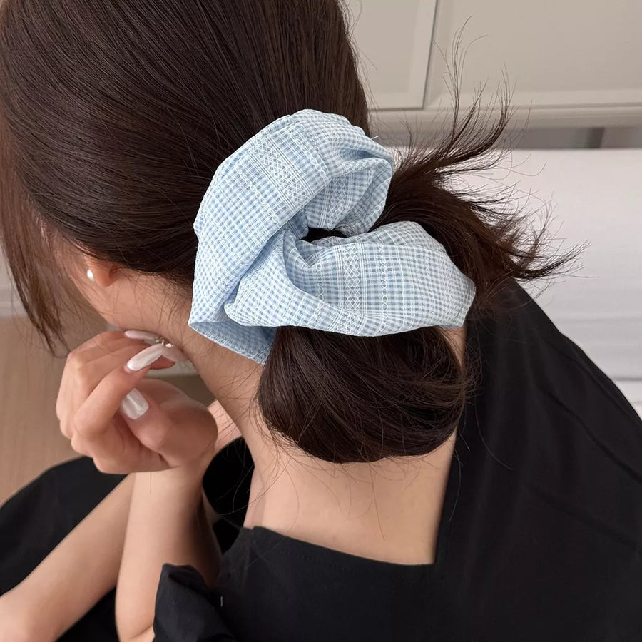 light blue scrunchie with elastic and gingham, plaid, striped