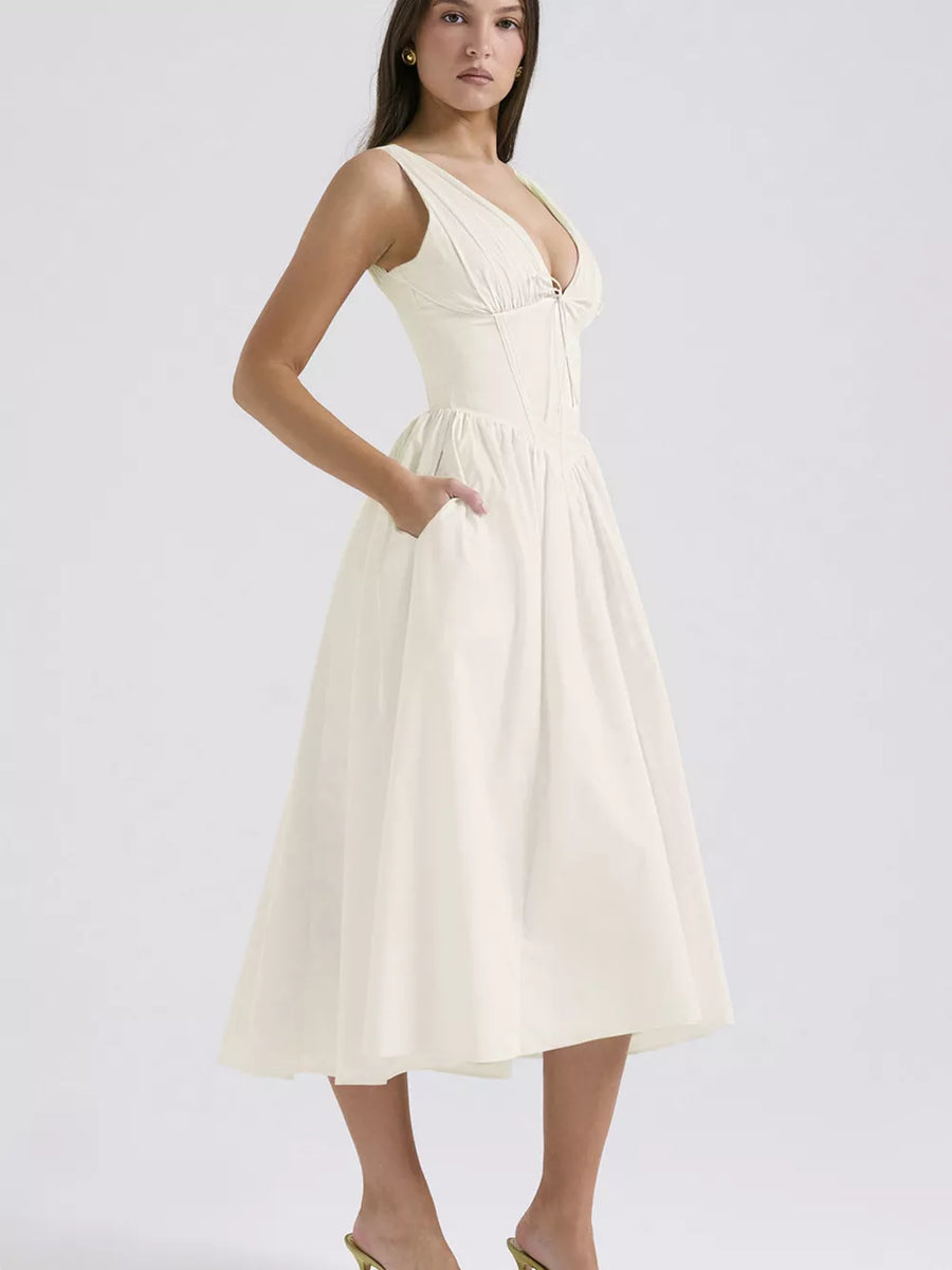 Cream V-neck midi dress with gathered bust and A-line skirt with pockets.