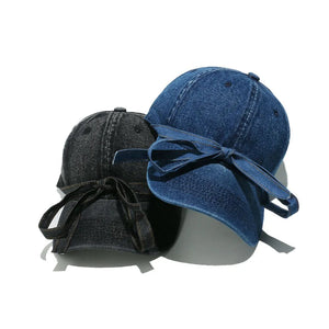 Denim baseball cap in navy or black with a bow tie detail