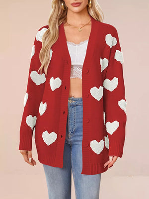white cardigan featuring buttoned and heart