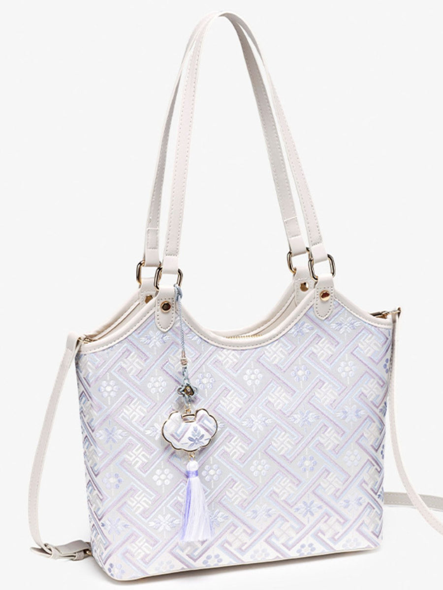 shoulder bag in off-white with geometric and shoulder straps