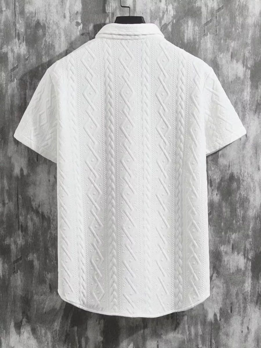 White knit polo shirt with textured cable knit pattern and short sleeves.
