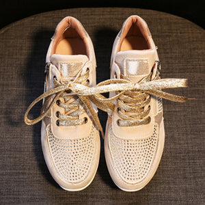Khaki rhinestone embellished lace-up sneakers with gold laces and chunky sole.