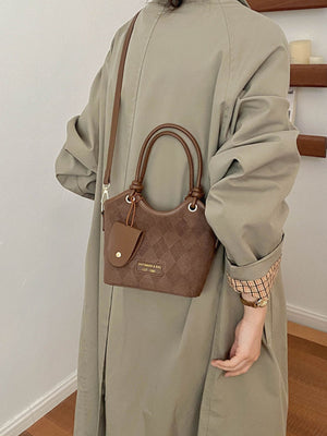 brown crossbody bag with snap and quilted
