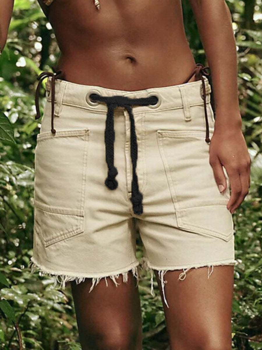 denim shorts in Black with raw hem and mini