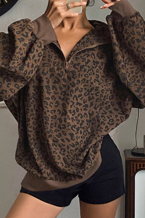 brown sweatshirt with hip-length and quarter-zip