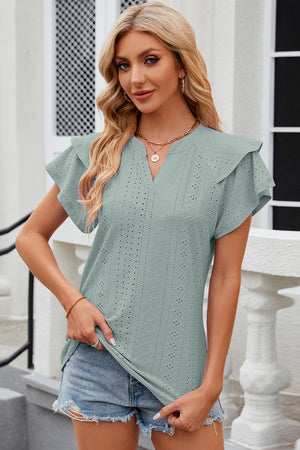 Sage eyelet flutter sleeve blouse with v-neck and ruffled details.