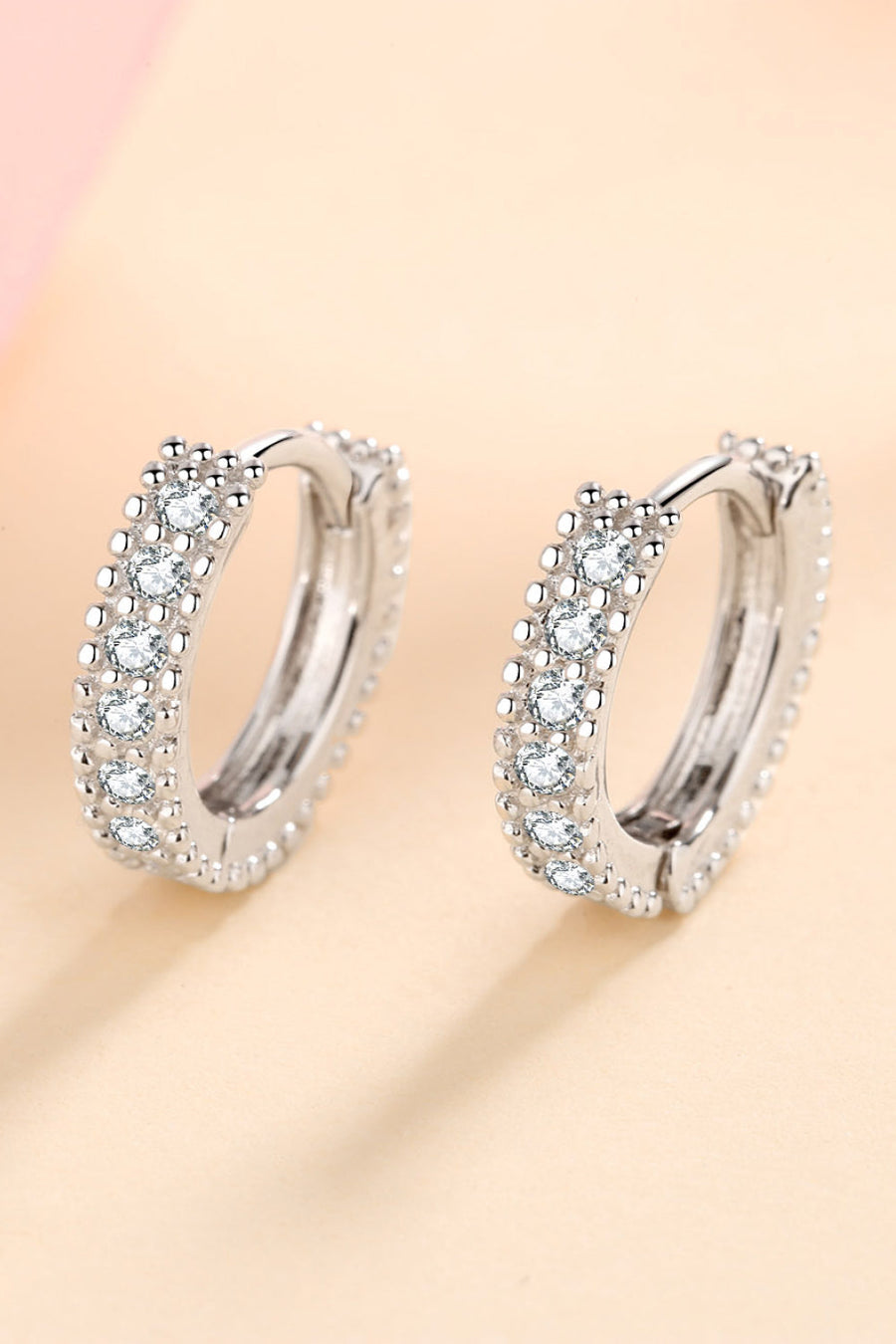 Silver pavé and beaded hoop earrings with clear stones