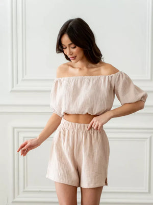 Off-shoulder cropped top and shorts set in Khaki cotton, with elastic waist shorts and puff sleeves.