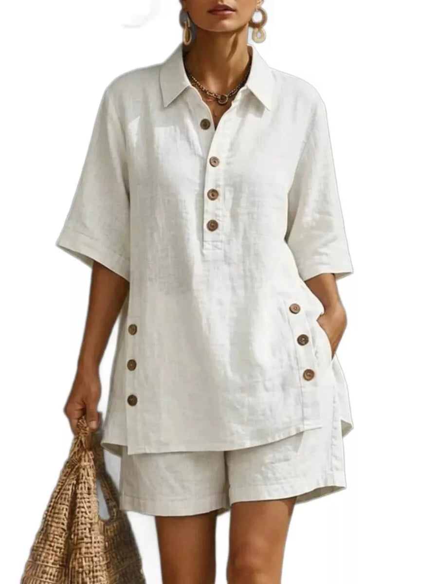 White linen shorts and button-up shirt set with half sleeves and side button detail.