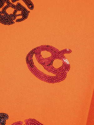 orange crewneck sweater