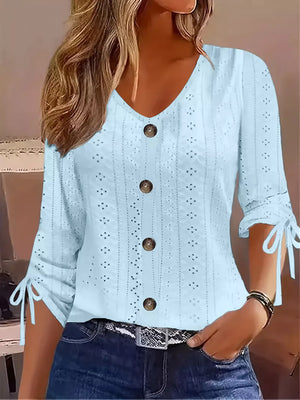White blouse with buttoned placket and 3/4 sleeve