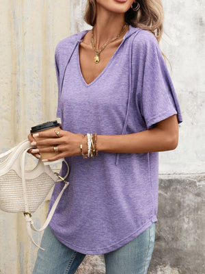 Purple hooded t-shirt with short sleeves and V-neck, styled casually.