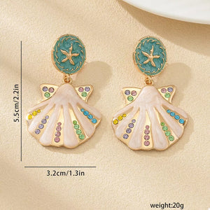 earrings in light pink with motif and dangle