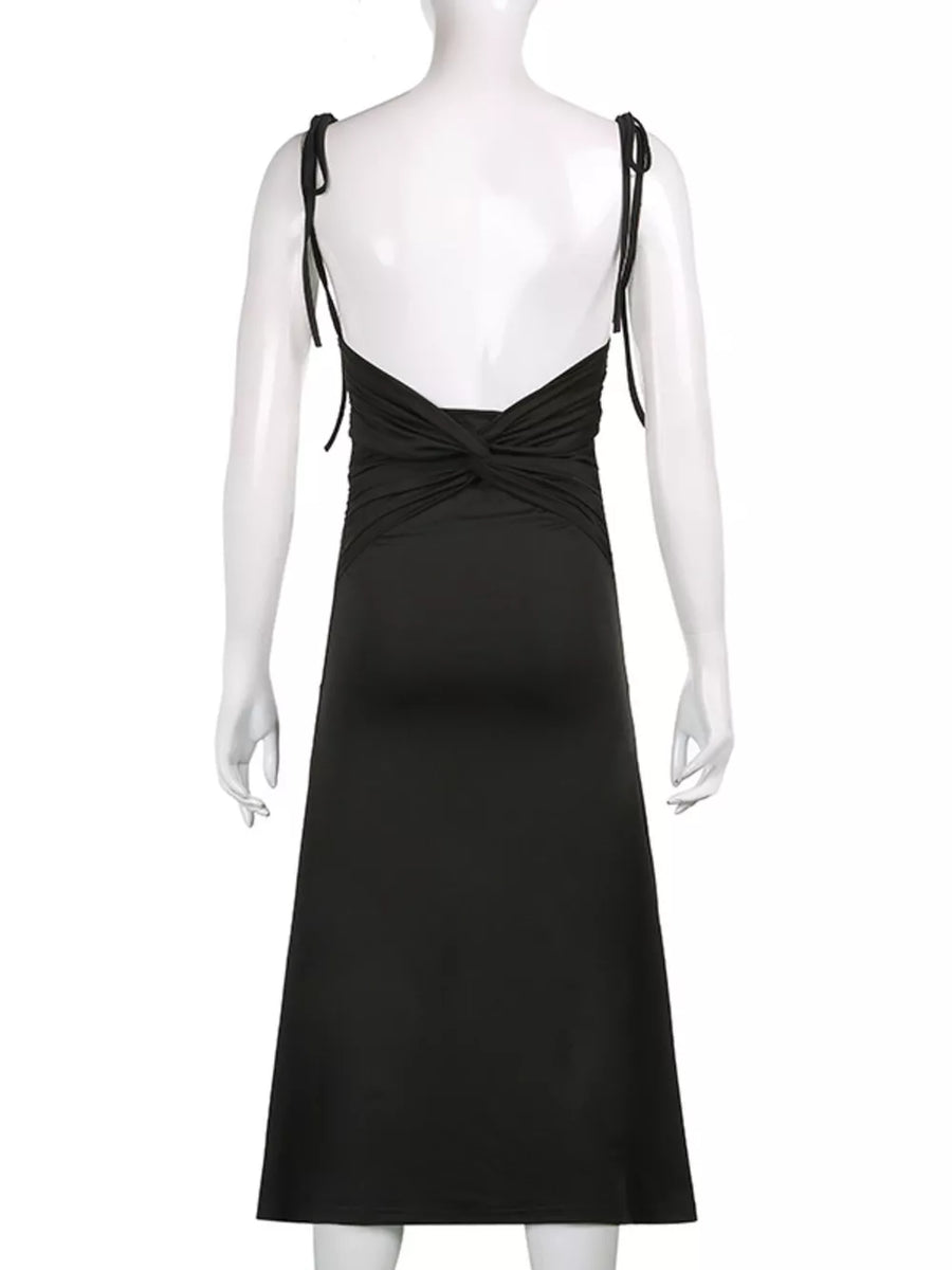 Black ruched midi dress with tie straps and a knotted back detail.
