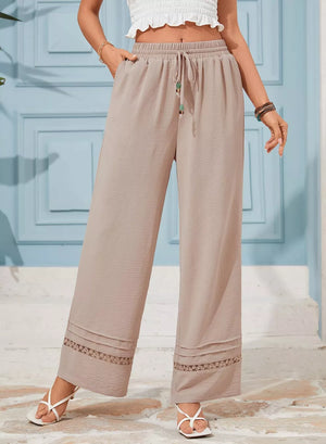 Tan relaxed wide-leg maternity pants with drawstring and lace trim detail