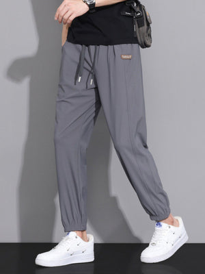 joggers in Light Gray with drawstring and full-length