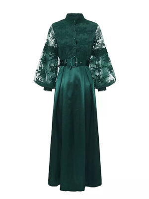 Green lace-embellished maxi dress with lantern sleeves and button-down front.