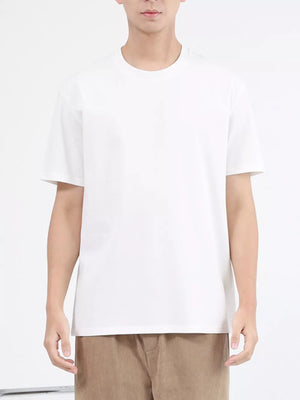 White cotton crew neck t-shirt with short sleeves.