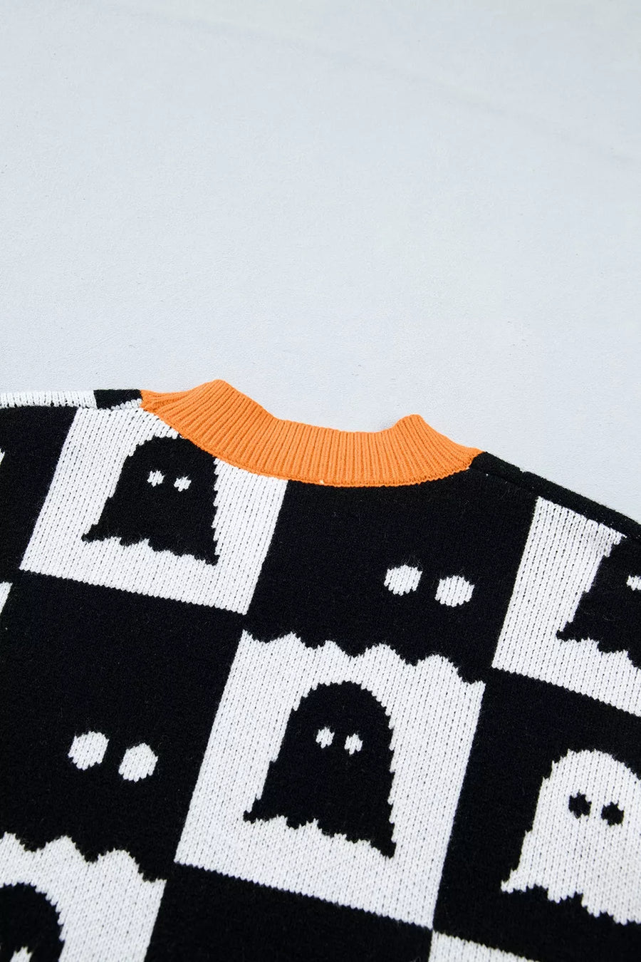 orange pullover sweater with pullover and checkerboard