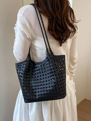 shoulder bag in black featuring woven and boxy fit