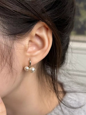earrings in ivory featuring pearl accent and straight fit