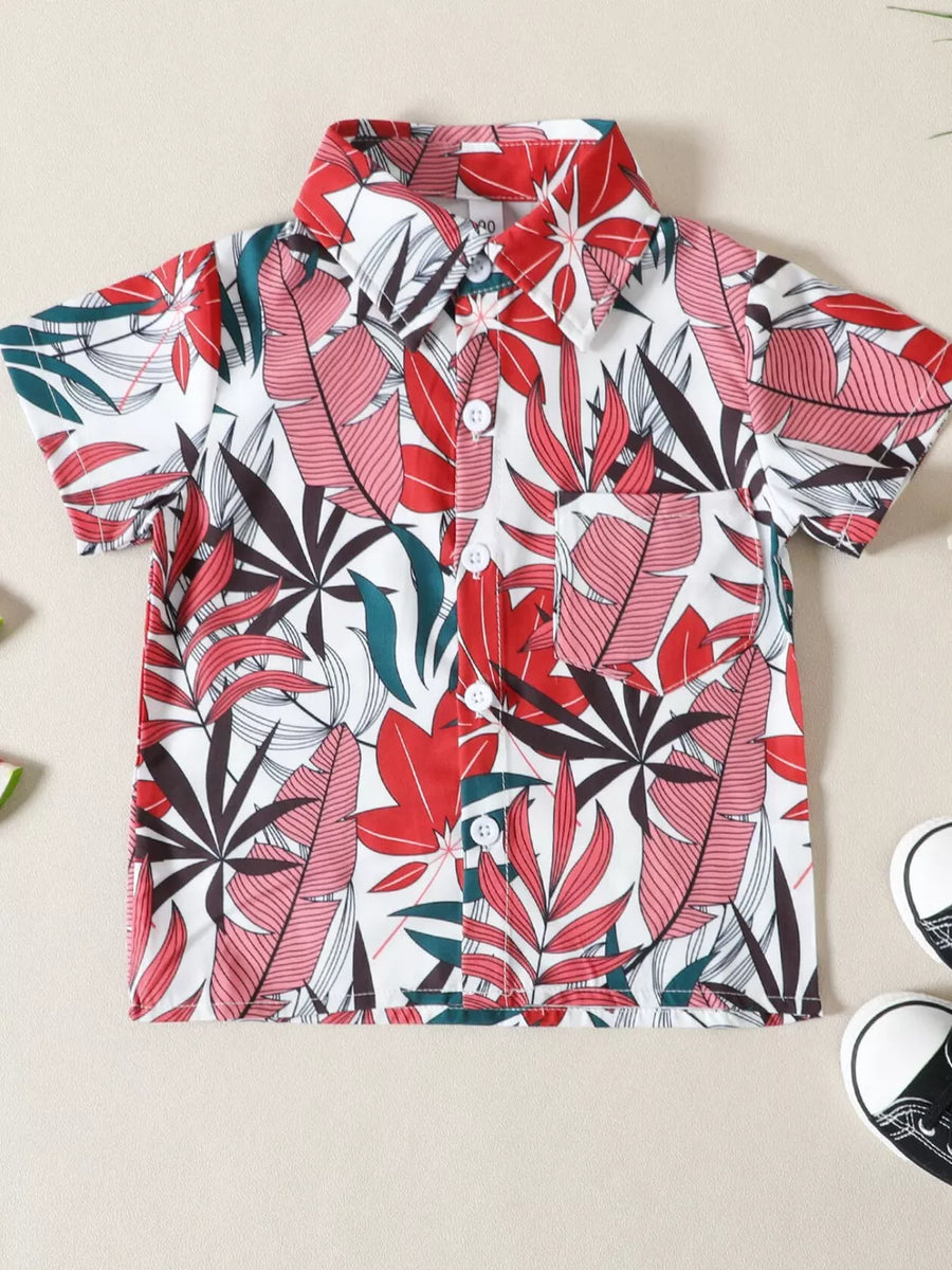 Toddler tropical leaf print button-front shirt with pocket, cotton blend.