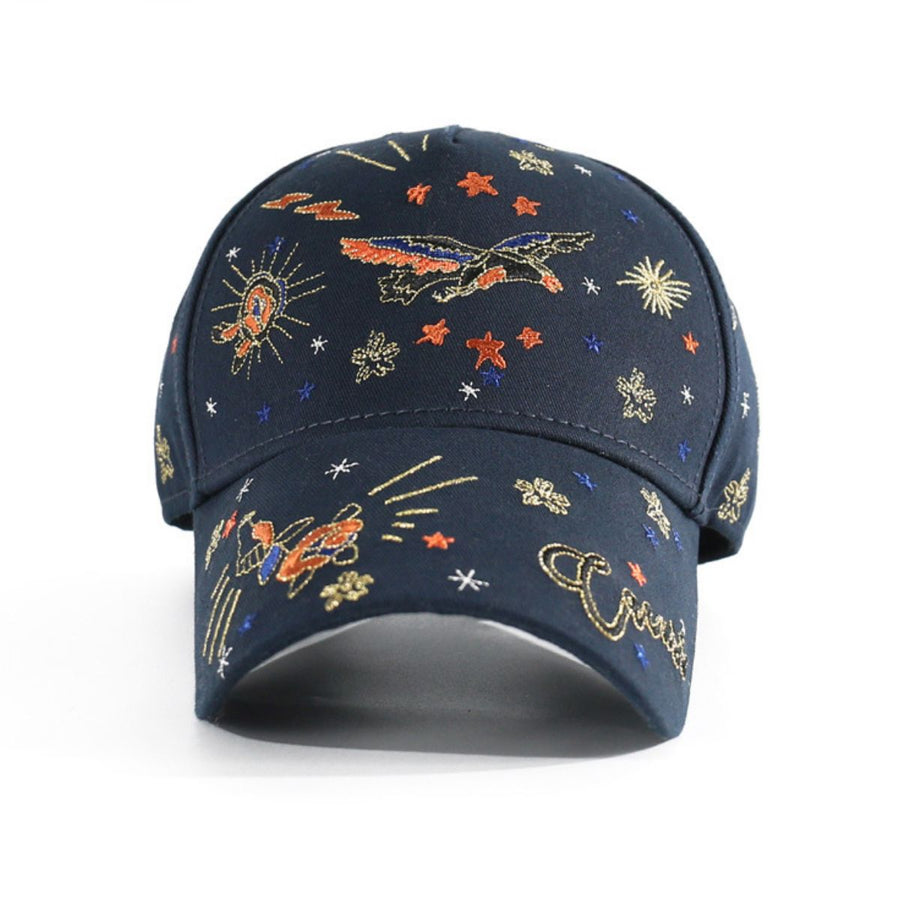 Navy blue cotton baseball cap with intricate embroidered celestial and flying motifs.