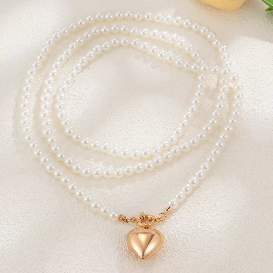 Synthetic Pearl,18K Gold-Plated,Resin Care instructions: Avoid wearing during ex necklace in gold with NA silhouette