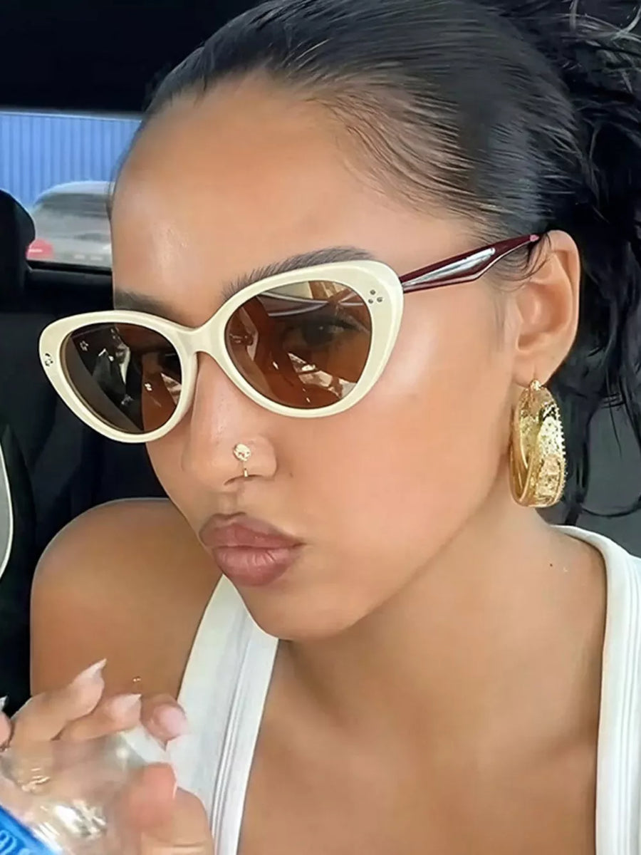 sunglasses in ivory featuring UV400 protection and cat-eye fit