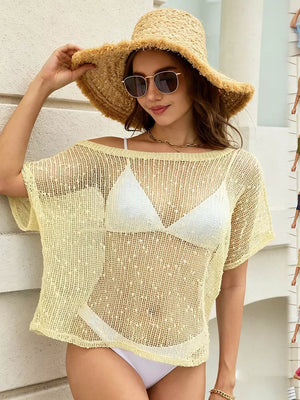 Light yellow crochet knit swim cover-up with openwork pattern and wide neckline.
