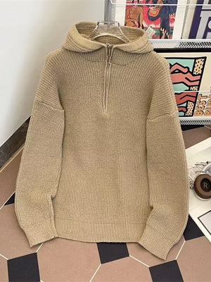Khaki knit hooded half-zip sweater with ribbed texture and relaxed fit.