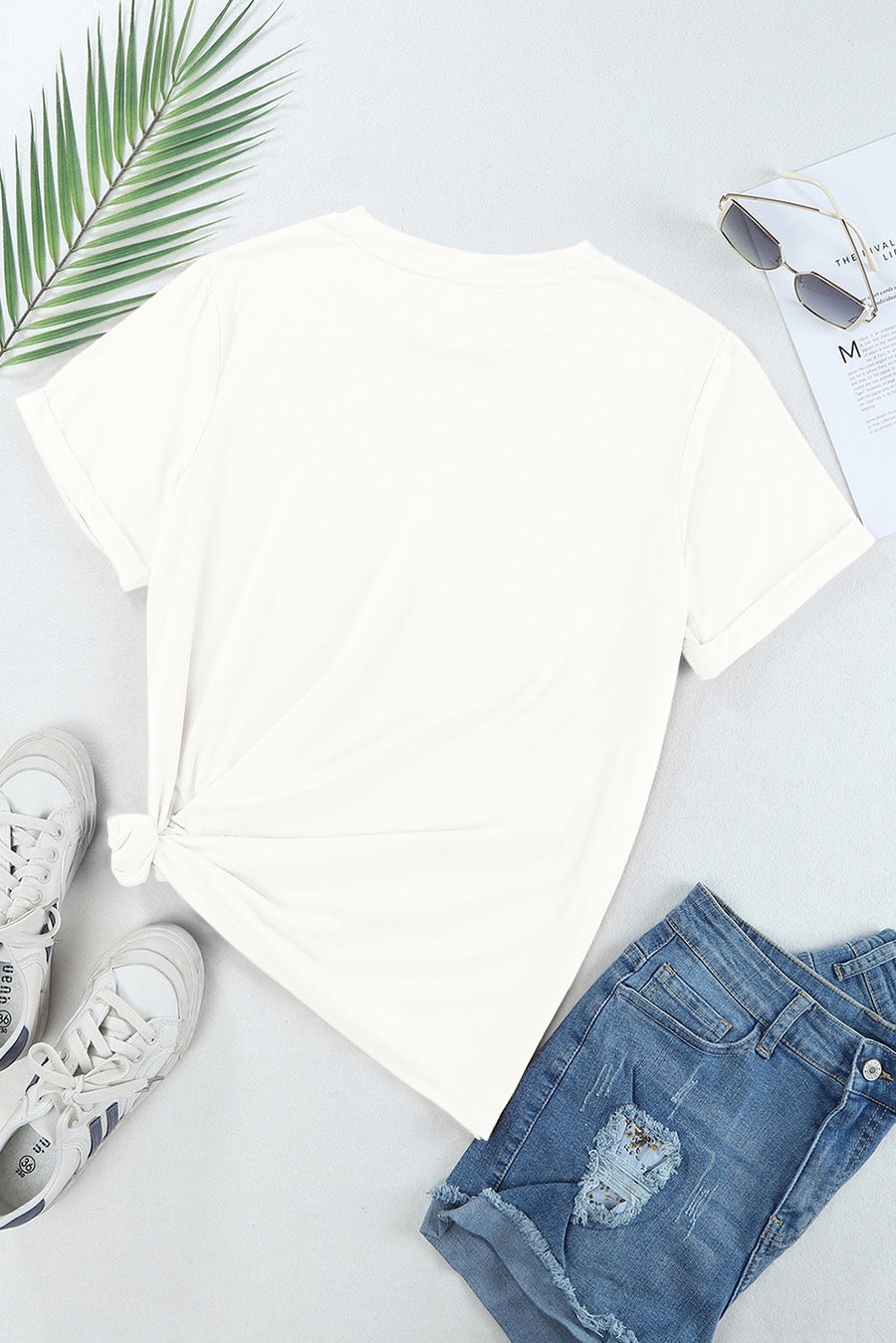 White embroidered America tee with rolled sleeves and knotted side detail