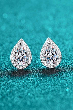 Silver teardrop halo earrings with pavé accents and a central faceted gem.