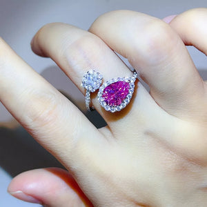ring in silver featuring moissanite stones and bypass fit